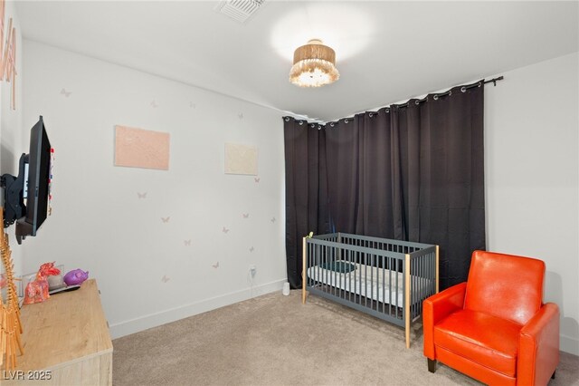 389 Red Feather Peak Ct, Las Vegas, NV 89138 - bedroom with carpet floors and a crib