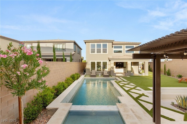 389 Red Feather Peak Ct, Las Vegas, NV 89138 - back of house with a fenced backyard, stucco siding, and a patio area