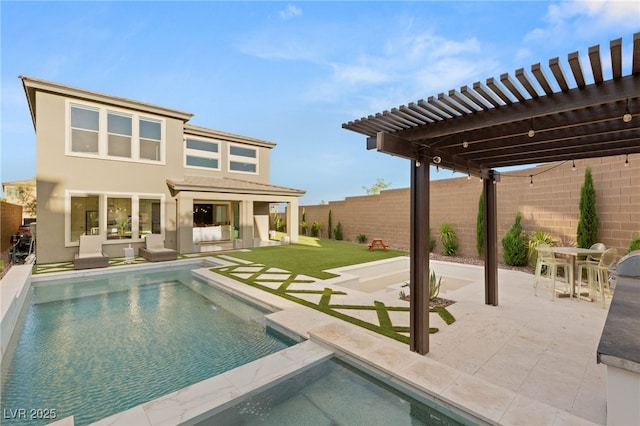389 Red Feather Peak Ct, Las Vegas, NV 89138 - back of house featuring a pergola, a fenced backyard, a patio area, and stucco siding