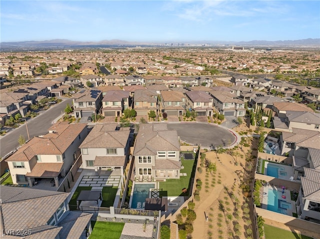 389 Red Feather Peak Ct, Las Vegas, NV 89138 - aerial view of property's location with nearby suburban area and a mountainous background