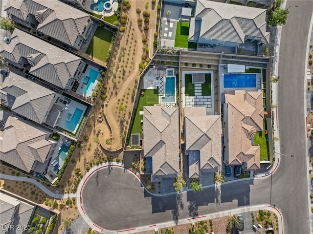 389 Red Feather Peak Ct, Las Vegas, NV 89138 - aerial view of residential area with a pool area