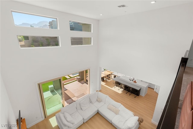 389 Red Feather Peak Ct, Las Vegas, NV 89138 - living area with wood finished floors and recessed lighting