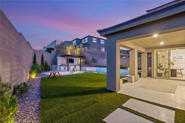 389 Red Feather Peak Ct, Las Vegas, NV 89138 - fenced backyard with a patio area