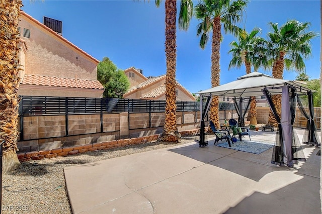 6652 Coral Springs Cir, Las Vegas, NV 89108 - fenced backyard with a patio area and a gazebo