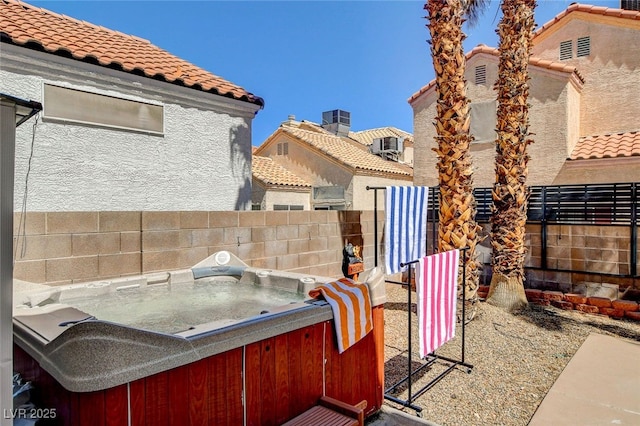 6652 Coral Springs Cir, Las Vegas, NV 89108 - view of patio / terrace with a hot tub