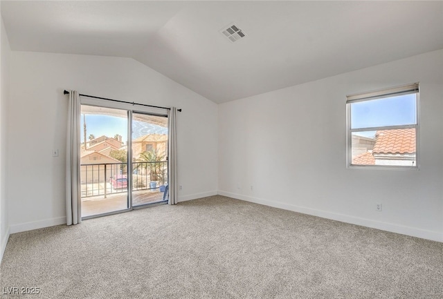 6652 Coral Springs Cir, Las Vegas, NV 89108 - spare room with vaulted ceiling, light carpet, and healthy amount of natural light