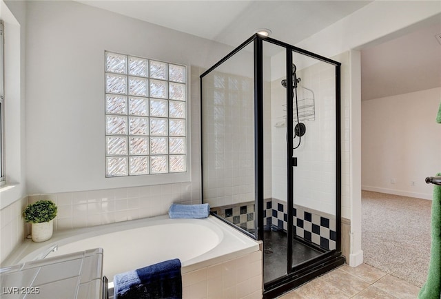 6652 Coral Springs Cir, Las Vegas, NV 89108 - full bathroom with a stall shower, a bath, and tile patterned flooring