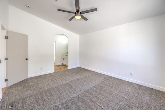 6456 First View Ave, Las Vegas, NV 89142 - spare room with ceiling fan, carpet flooring, and arched walkways