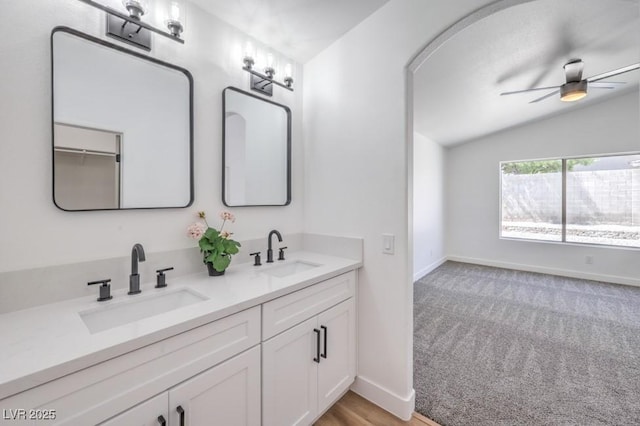6456 First View Ave, Las Vegas, NV 89142 - bathroom with double vanity, lofted ceiling, and a ceiling fan