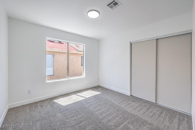 6456 First View Ave, Las Vegas, NV 89142 - unfurnished bedroom featuring carpet and a closet