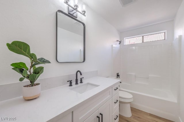 6456 First View Ave, Las Vegas, NV 89142 - full bath featuring vanity, wood finished floors, and washtub / shower combination