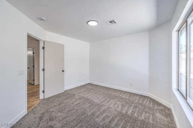 6456 First View Ave, Las Vegas, NV 89142 - carpeted empty room featuring a smoke detector and baseboards