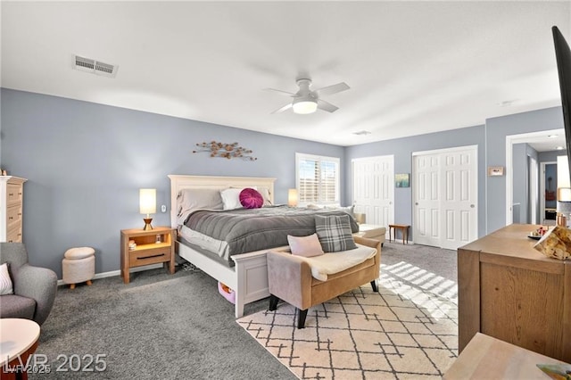 262 Cielito Lindo St, Henderson, NV 89012 - bedroom with two closets, light carpet, and a ceiling fan