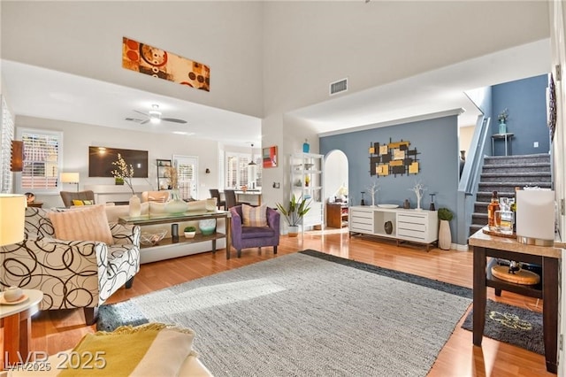 262 Cielito Lindo St, Henderson, NV 89012 - living room featuring wood finished floors, stairs, and a ceiling fan