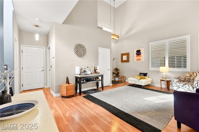 262 Cielito Lindo St, Henderson, NV 89012 - living room featuring a high ceiling and light wood-style floors