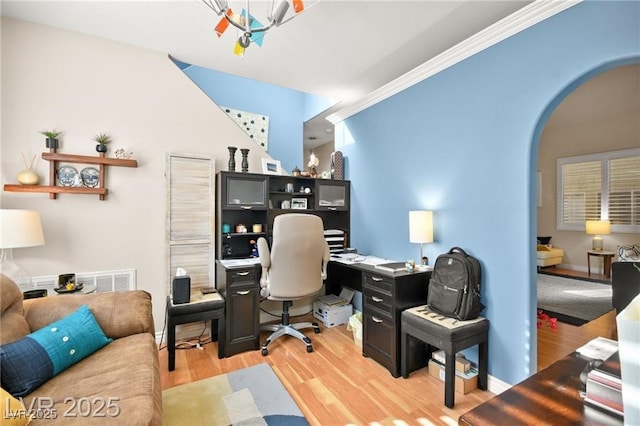 262 Cielito Lindo St, Henderson, NV 89012 - office space with arched walkways, wood finished floors, and a chandelier