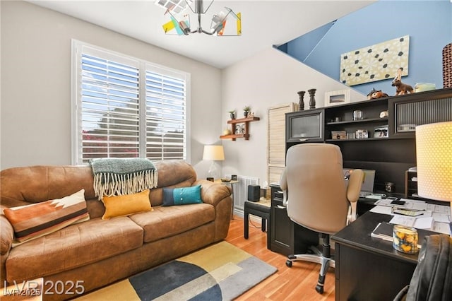 262 Cielito Lindo St, Henderson, NV 89012 - office area featuring light wood-style floors and a chandelier