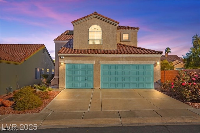 262 Cielito Lindo St, Henderson, NV 89012 - mediterranean / spanish home with concrete driveway, stucco siding, a tiled roof, and solar panels