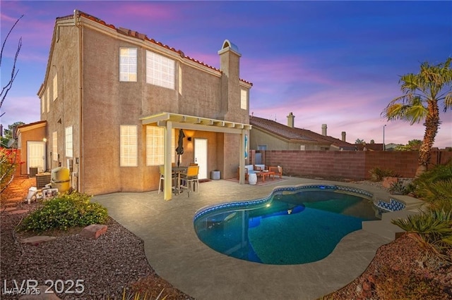 262 Cielito Lindo St, Henderson, NV 89012 - pool at dusk featuring a fenced backyard and a patio