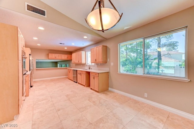 8729 Pesaro Dr, Las Vegas, NV 89117 - kitchen featuring stainless steel appliances, recessed lighting, light countertops, light brown cabinets, and light tile patterned floors