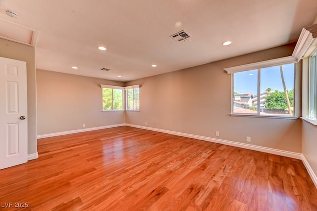8729 Pesaro Dr, Las Vegas, NV 89117 - spare room featuring a smoke detector, light wood-style floors, and recessed lighting