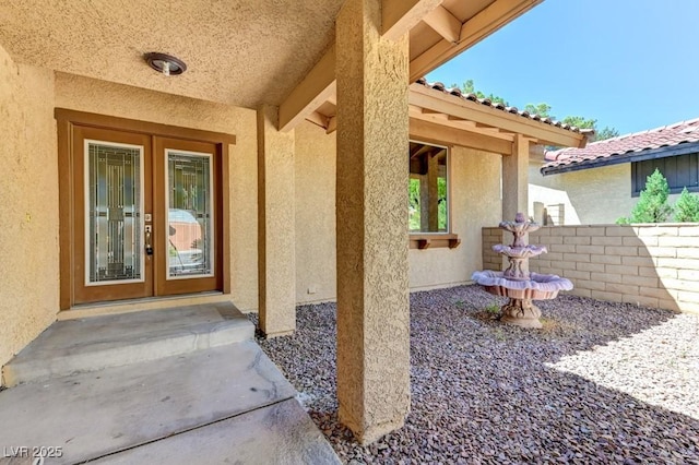 8729 Pesaro Dr, Las Vegas, NV 89117 - entrance to property with stucco siding and french doors