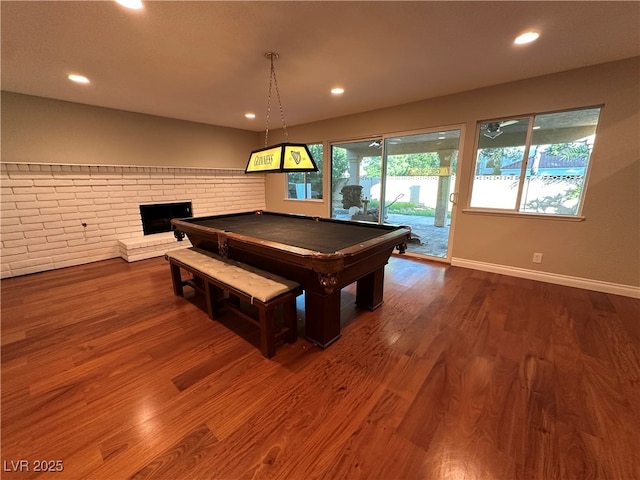 8729 Pesaro Dr, Las Vegas, NV 89117 - rec room featuring billiards table, recessed lighting, dark wood finished floors, and a brick fireplace