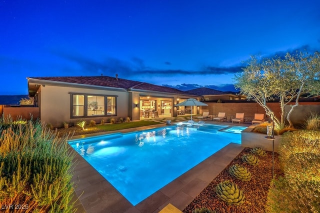 12544 Claymore Highland Ave, Las Vegas, NV 89138 - view of pool featuring a patio and a pool with connected hot tub