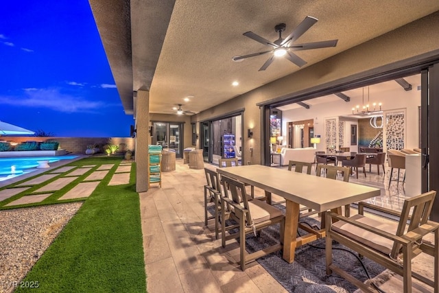 12544 Claymore Highland Ave, Las Vegas, NV 89138 - fenced backyard featuring ceiling fan, a patio area, and outdoor dining area