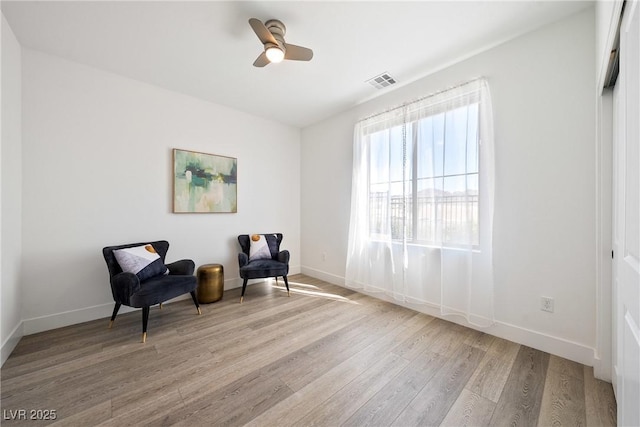 2722 Marchetti Pl, Henderson, NV 89044 - sitting room with wood finished floors and a ceiling fan