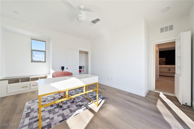 2722 Marchetti Pl, Henderson, NV 89044 - dining space featuring wood finished floors, a desk, and a ceiling fan