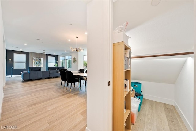 2722 Marchetti Pl, Henderson, NV 89044 - stairway featuring a chandelier, wood finished floors, and recessed lighting