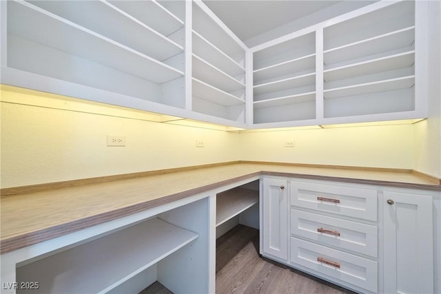 2722 Marchetti Pl, Henderson, NV 89044 - unfurnished office featuring built in desk and wood finished floors