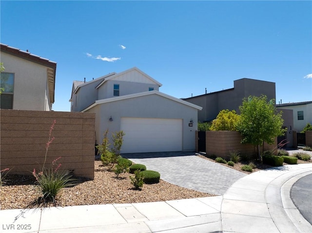 2722 Marchetti Pl, Henderson, NV 89044 - view of front of home with decorative driveway, a garage, and stucco siding