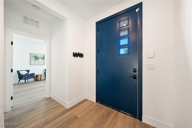 2722 Marchetti Pl, Henderson, NV 89044 - foyer with light wood-type flooring and baseboards