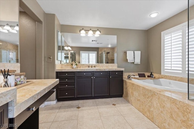 364 Trentino Alto St, Henderson, NV 89012 - full bath featuring a shower stall, vanity, a garden tub, and tile patterned floors