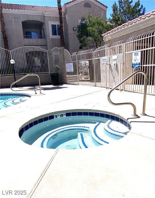 9470 Peace Way Unit 212, Las Vegas, NV 89147 - community pool with a hot tub