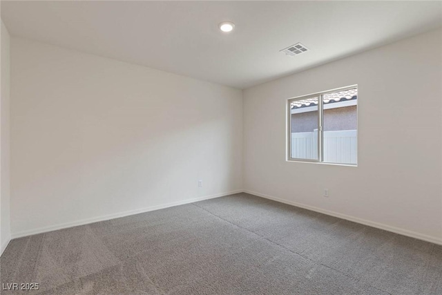 1713 Desert Path Ave, North Las Vegas, NV 89032 - carpeted empty room with baseboards and recessed lighting