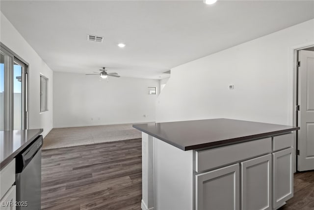 4216 Golden Sol St, North Las Vegas, NV 89032 - kitchen featuring dishwasher, a ceiling fan, dark countertops, recessed lighting, and dark wood-style floors