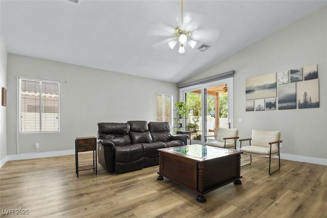 2512 Huber Heights Dr, Las Vegas, NV 89128 - living room featuring ceiling fan, lofted ceiling, and light wood-style floors