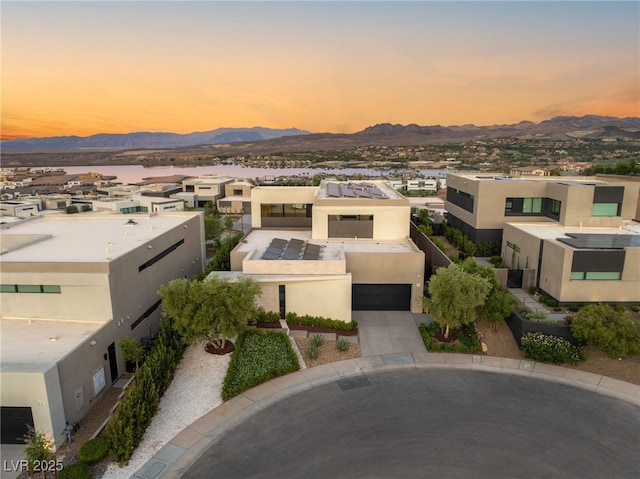 12 Desert Lake Ln, Henderson, NV 89011 - aerial view at dusk of a mountain view and a residential view