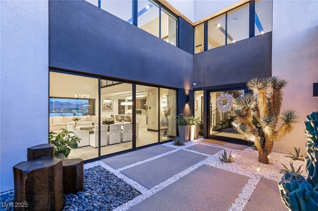 12 Desert Lake Ln, Henderson, NV 89011 - entrance to property featuring stucco siding and area for grilling
