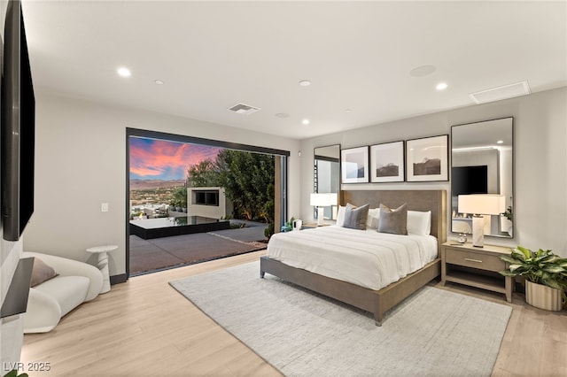 12 Desert Lake Ln, Henderson, NV 89011 - bedroom with access to outside, light wood finished floors, and recessed lighting