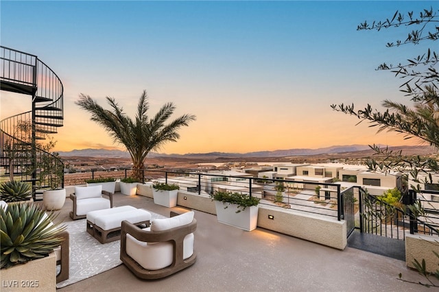 12 Desert Lake Ln, Henderson, NV 89011 - patio terrace at dusk featuring stairway and a mountain view