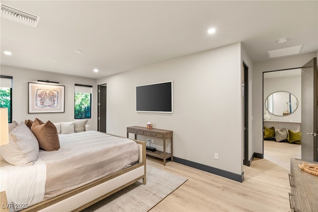 12 Desert Lake Ln, Henderson, NV 89011 - bedroom with light wood-style floors and recessed lighting