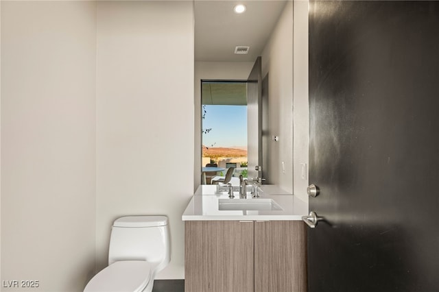 12 Desert Lake Ln, Henderson, NV 89011 - half bathroom with toilet and vanity