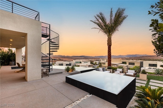 12 Desert Lake Ln, Henderson, NV 89011 - view of patio featuring stairway and a mountain view