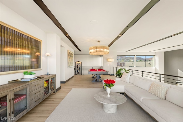 12 Desert Lake Ln, Henderson, NV 89011 - living area with light wood finished floors and beam ceiling