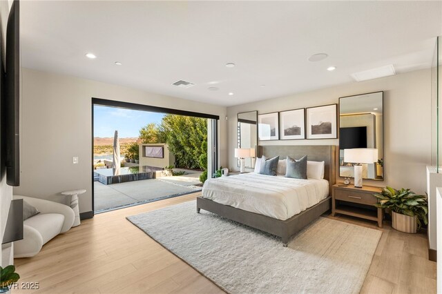 12 Desert Lake Ln, Henderson, NV 89011 - bedroom with access to outside, light wood finished floors, and recessed lighting