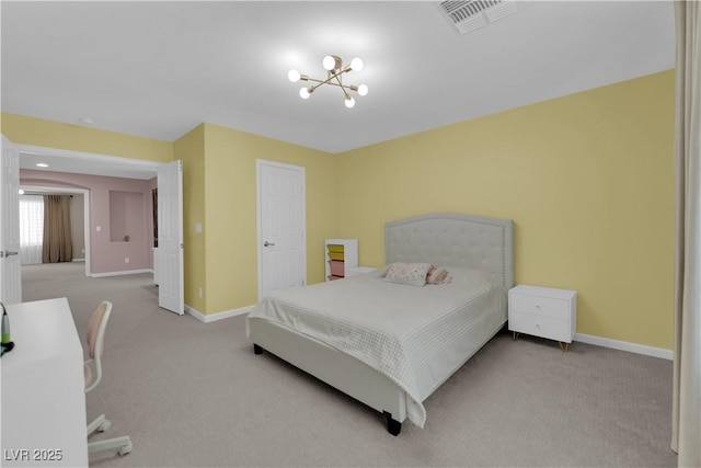 5788 Robin Ridge Ave, Las Vegas, NV 89141 - carpeted bedroom with a chandelier and baseboards